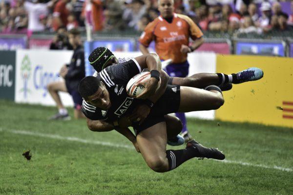 Fiji stops a fast New Zealand run for the try line with this acrobatic tackle. (Bill Cox/Epoch Times)
