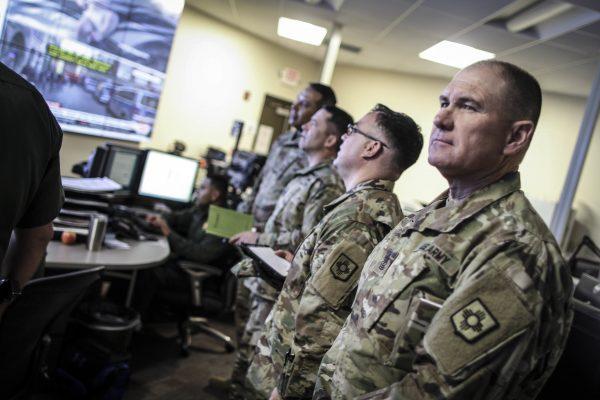 The New Mexico Army National Guard liaison team visits the El Paso Sector's Border Patrol Intelligence Operations Center to coordinate for their upcoming deployment in support border enforcement, on April 7, 2018. (Marcus Trujillo/Border Patrol)