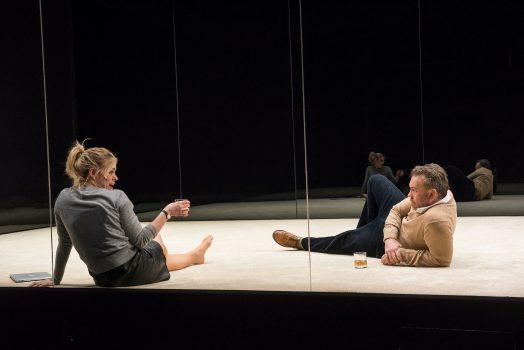 Billie Piper and Brendan Cowell play a couple trying to conceive. The planes of glass that serve as the set’s walls distance the audience from the unfolding drama. (Stephanie Berger)