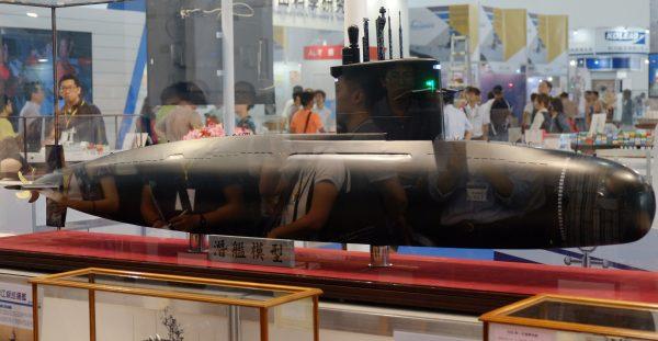 Visitors walking past a conceptual design model of Taiwan’s indigenous submarine during the Kaohsiung International Maritime and Defense Exhibition on Sept. 13, 2016. (Sam Yeh/AFP/Getty Images)