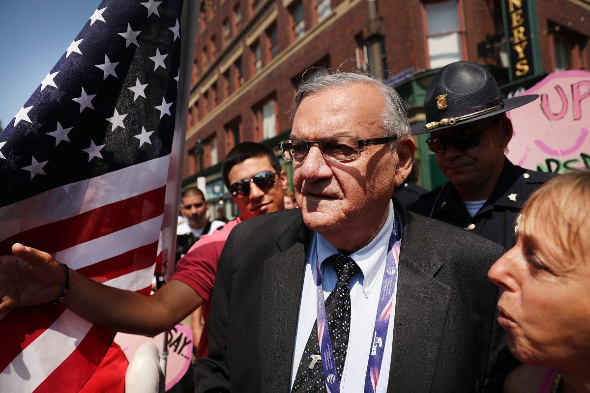 Maricopa County Sheriff Joe Arpaio is surrounded by protesters and members of the media at the the site of the Republican National Convention (RNC) in downtown Cleveland on the second day of the convention on July 19, 2016 in Cleveland, Ohio. (Spencer Platt/Getty Images)
