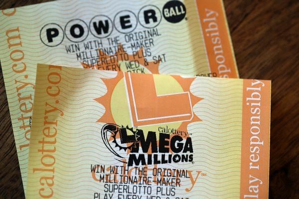 Powerball and Mega Millions lottery tickets are displayed on January 3, 2018 in San Anselmo, California. (Justin Sullivan/Getty Images)