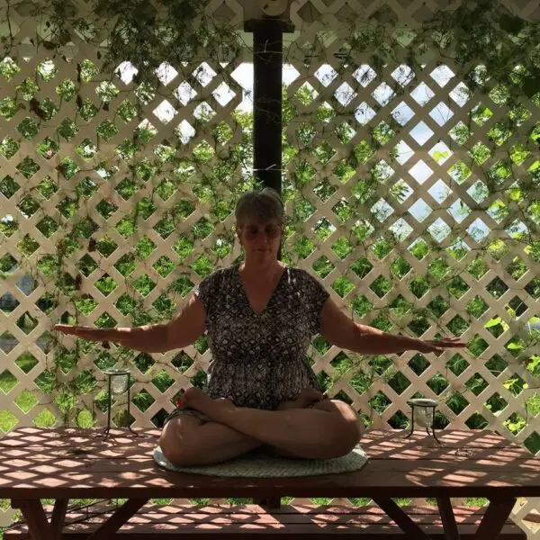  Barbara Gay performing one of Falun Dafa's meditative exercises in a recent photo.