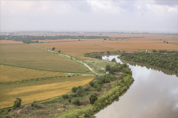 "A view of the Rio Grande, which doubles as the U.S.–Mexico border, from a helicopter flying over the Rio Grande Valley sector in Texas on May 30, 2017. (Benjamin Chasteen/The Epoch Times)