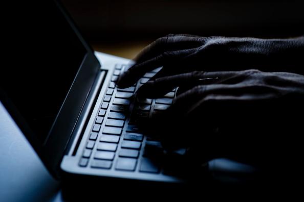 Hands typing on a computer keyboard on February 06, 2018 in Berlin, Germany. (Thomas Trutschel/Photothek via Getty Images)