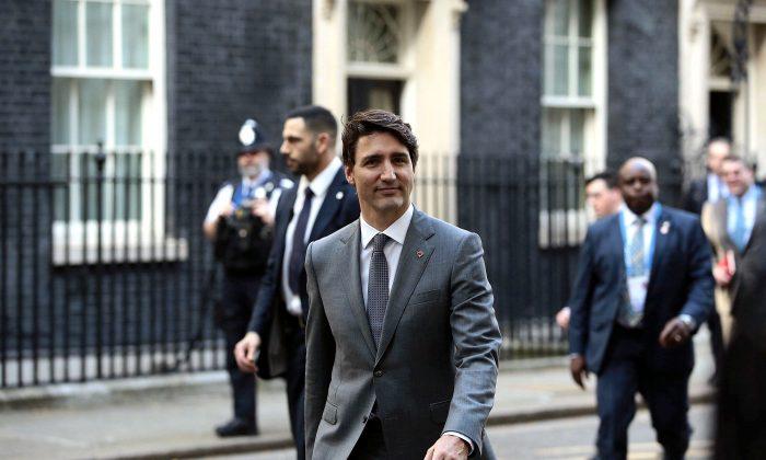 Pipeline Protest Greets Trudeau in London Ahead of Meetings With Queen, May
