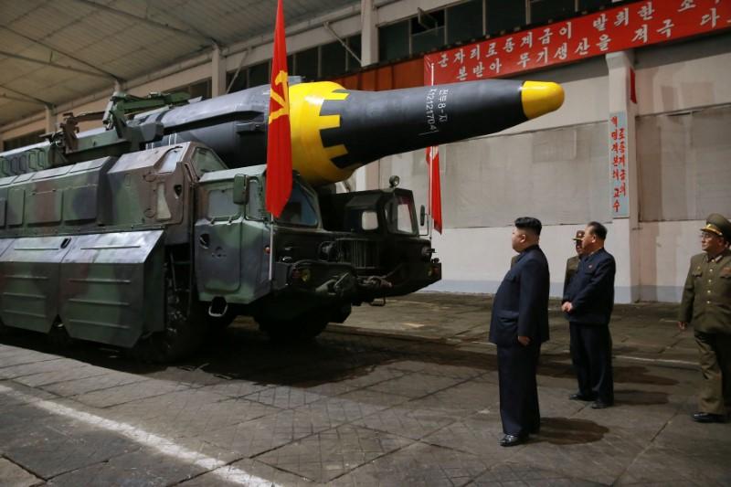 North Korean leader Kim Jong Un inspects the long-range strategic ballistic rocket Hwasong-12 (Mars-12) in this undated photo. (KCNA/Reuters)