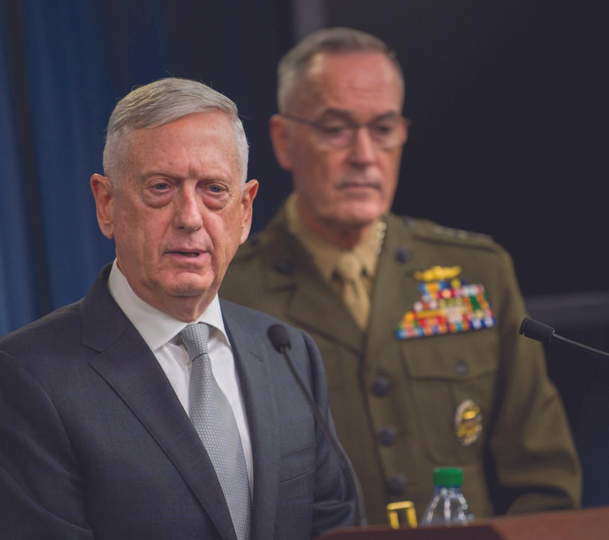 Defense Secretary Gen. Jim Mattis (L) and Gen. Joe Dunford, chairman of the Joint Chiefs of Staff, brief reporters following airstrikes on Syria on April 13. (DOD/ARMY SGT. AMBER I. SMITH)