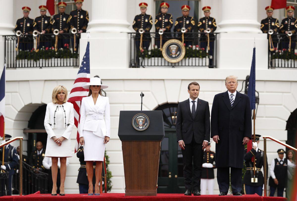 President Donald Trump (R) and first lady Melania Trump preside over the official arrival ceremony for French President Emmanuel Macron and his wife Brigitte Macron (L) on the South Lawn of the White House in Washington on April 24, 2018. (REUTERS/Jonathan Ernst)