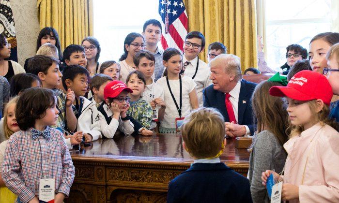 PHOTOS: Trump Invites the Children of Media and Staff to Oval Office