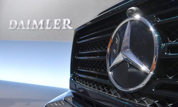Daimler Cuts Dividend as Downturn, R&D Costs Hit Mercedes