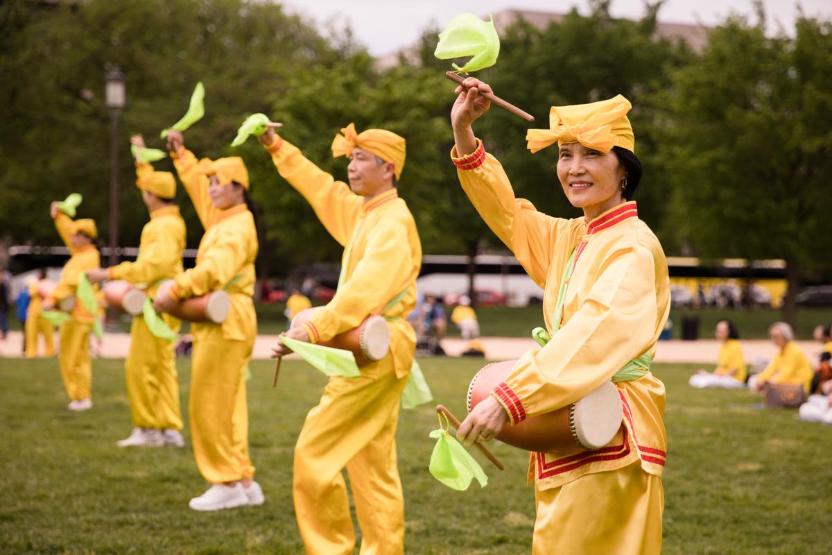 A waist drum troupe performs at the World Falun Dafa Day celebration on the National Mall in Washington on May 5, 2018. (Samira Bouaou/Epoch Times)