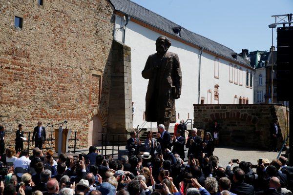 A bronze statue of Karl Marx donated by China to mark the 200th birth anniversary of the German philosopher, is seen in his hometown Trier, Germany, on May 5, 2018. (Wolfgang Rattay/Reuters)