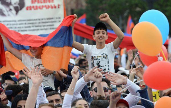 Supporters of Armenian protest leader Nikol Pashinyan celebrate after parliament elected Pashinyan as new Prime Minister in Yerevan, Armenia May 8, 2018. (Reuters/Hayk Baghdasaryan/Photolure)
