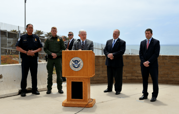 Attorney General Jeff Sessions speaks to media at Border Field State Park, San Diego, next to the fence separating the United States and Mexico, on May 7, 2018. (Sophia Fang for The Epoch Times)