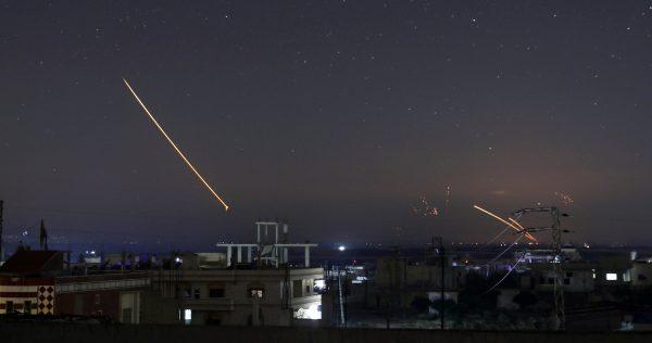 Missile fire is seen over Daraa, Syria on May 10. (Reuters/Alaa al-Faqir)