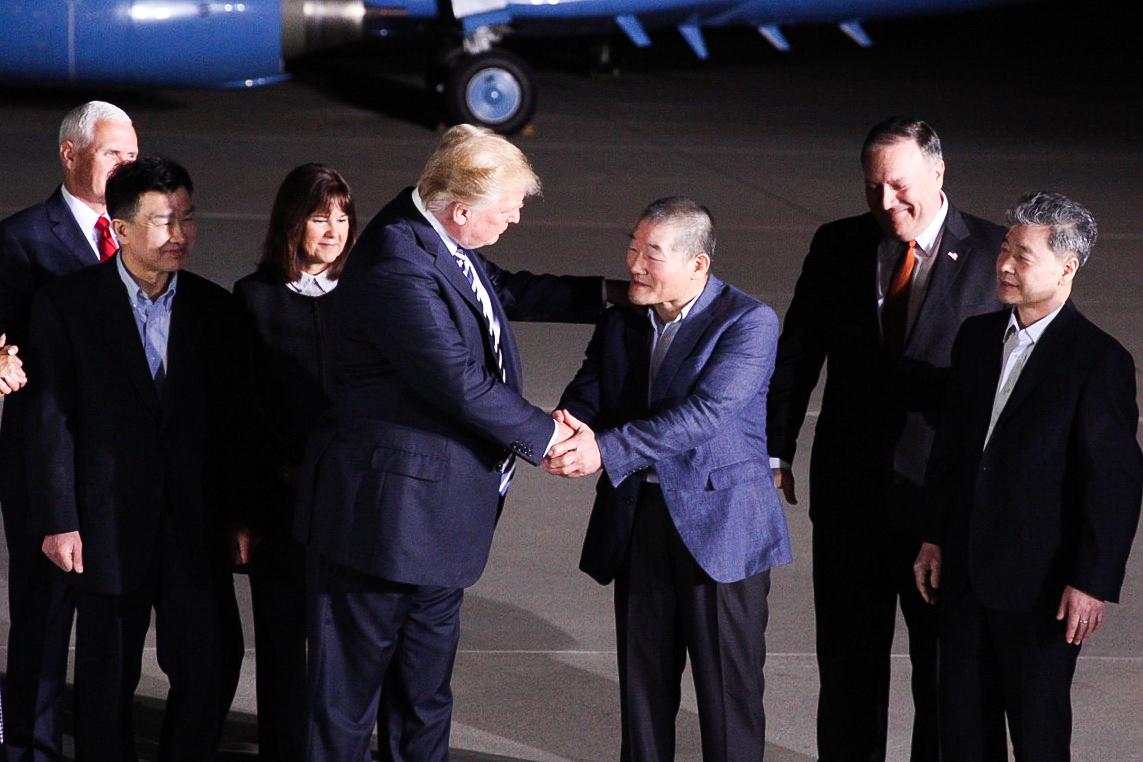 President Donald Trump greets the three Americans who arrived back in the United States after being imprisoned in North Korea, in Maryland, on May 10, 2018. (Samira Bouaou/The Epoch Times)