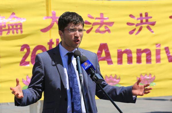 Conservative MP Garnett Genuis addresses the crowd celebrating the Falun Dafa Day on the Parliament Hill in Ottawa on May 9, 2018. (Jonathon Ren/The Epoch Times)