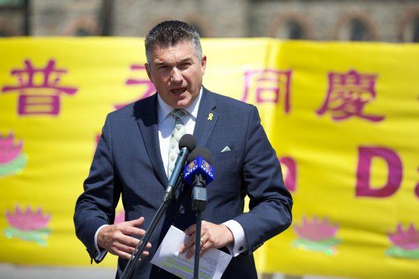 Conservative MP James Bezan addresses the crowd celebrating the Falun Dafa Day on the Parliament Hill in Ottawa on May 9, 2018. (Evan Ning/The Epoch Times)