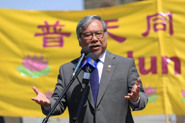 Senator Thanh Hai Ngo addresses the crowd celebrating Falun Dafa Day on Parliament Hill in Ottawa on May 9, 2018. (Jonathon Ren/The Epoch Times)