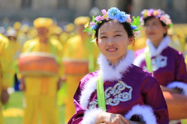 A Falun Dafa adherent who took part in dance and music performances as part of the Falun Dafa Day celebrations on Parliament Hill in Ottawa on May 9, 2018. (Jonathon Ren/The Epoch Times)