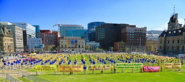 Falun Dafa adherents celebrate Falun Dafa Day on Parliament Hill in Ottawa on May 9, 2018. (Jonathon Ren/The Epoch Times)