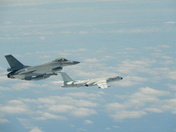 A Taiwanese Air Force F-16 fighter jet flies alongside a Chinese People's Liberation Army Air Force H-6K bomber in the western Pacific, one of the Chinese military aircraft that reportedly flew over Bashi Channel and Miyako Strait near Japan’s Okinawa island chain on the morning of May 11, 2018. (Taiwan ROC Air Force)