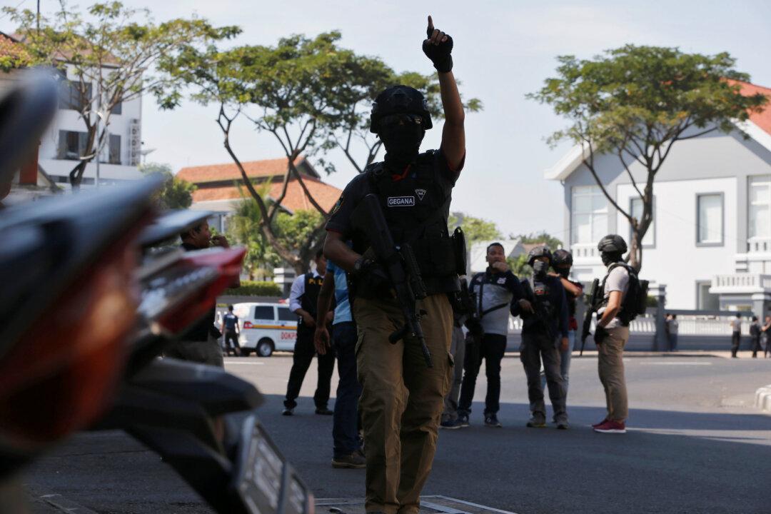 Suicide Bomber on Motorbike Wounds Police in Indonesia’s Surabaya