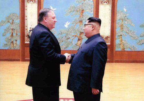 CIA director Mike Pompeo (L) shakes hands with North Korean leader Kim Jong Un in Pyongyang, North Korea on March 31, 2018. (Photo by The White House via Getty Images)