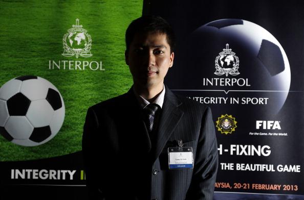 Ministry of Public Security in China and speaker for match-fixing investigation during an INTERPOL conference at a hotel on February 20, 2013, in Kuala Lumpur, Malaysia. (Stanley Chou/Getty Images)