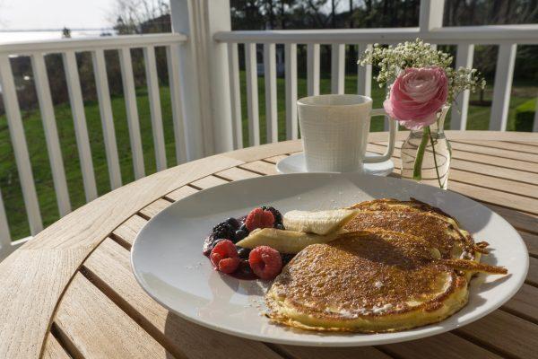 Breakfast on the balcony, with a view of the river. (Crystal Shi/The Epoch Times)