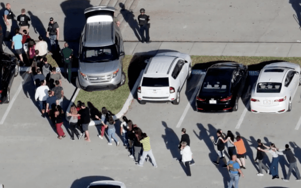 Several law-enforcement officers were praised on Friday for confronting the gunman who killed 10 people at a Santa Fe high school, in Texas. (screenshot via AP)