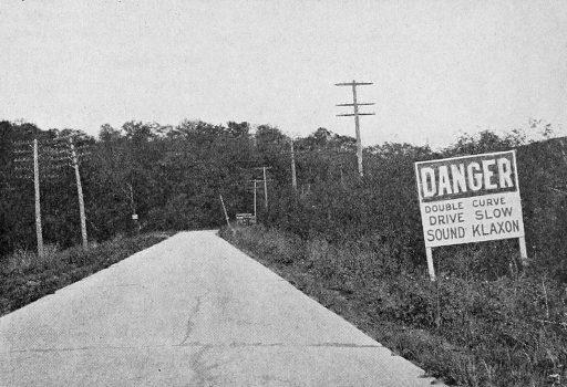 Sign on a rural road in the United States circa 1920, warning drivers to “sound klaxon.” The loud, identifiable "ahoooga” noise made by the Klaxon horn was banned by ordinance in Paris, London, and Chicago in the 1920s. (Public Domain)