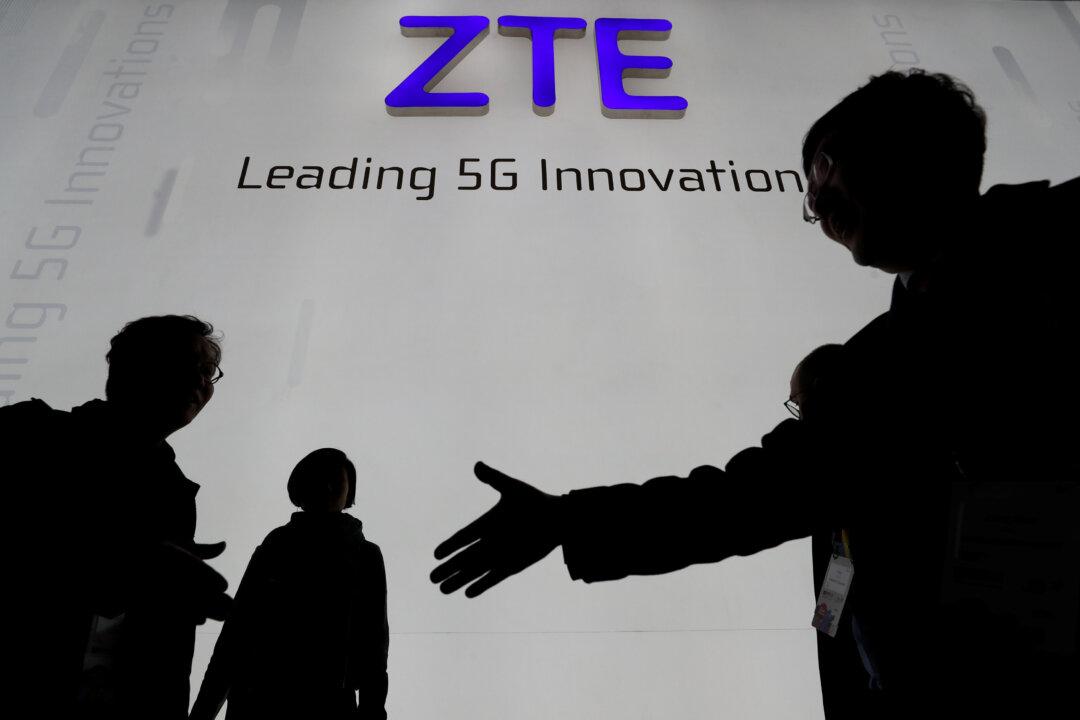 China, US Near Deal on ZTE Reprieve; Beijing Cuts Auto Tariffs