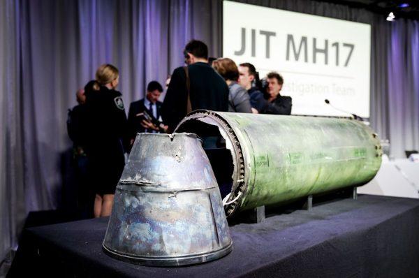 A part of the BUK-TELAR rocket that struck flight MH17 is displayed on a table during a press conference by the Joint Investigation Team (JIT), in Bunnik on May 24, 2018. (Robin Van Lonkhuijsen/AFP/Getty Images)