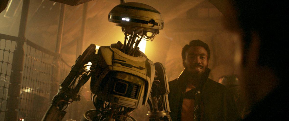 Phoebe Waller-Bridge as L3-37 (L) and  Donald Glover as Lando Calrissian, in "Solo: A Star Wars Story." (Lucasfilm/Walt Disney Pictures)