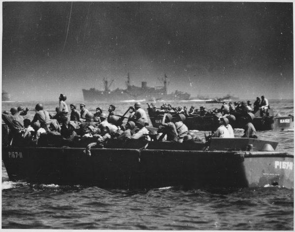 Landing barges carry U.S. troops to Leyte Island during the war in the Pacific of World War II in October 1944. (U.S. Coast Guard)