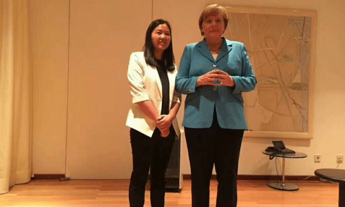 German Chancellor Merkel Meets With Wife of Detained Human Rights Lawyer, Yu Wensheng
