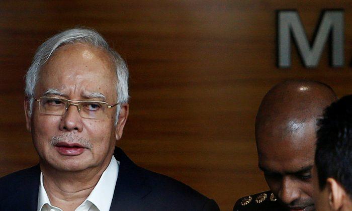 Malaysian Police Probing 1MDB Seized Over $28 Million in Cash, 400-Plus Handbags