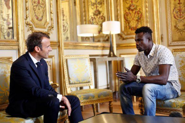 French President Emmanuel Macron (L) meets with Mamoudou Gassama, 22, from Mali, at the Elysee Palace in Paris, France on May 28, 2018. (Thibault Camus/Pool via Reuters)