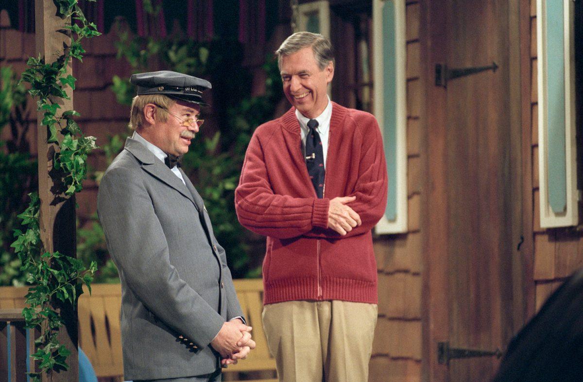 David Newell (as Speedy Delivery's Mr. McFeely) and Fred Rogers (R) stand on the front porch set while filming an episode of "Mister Rogers' Neighborhood." (Life Magazine/WQED Studio/Focus Features)