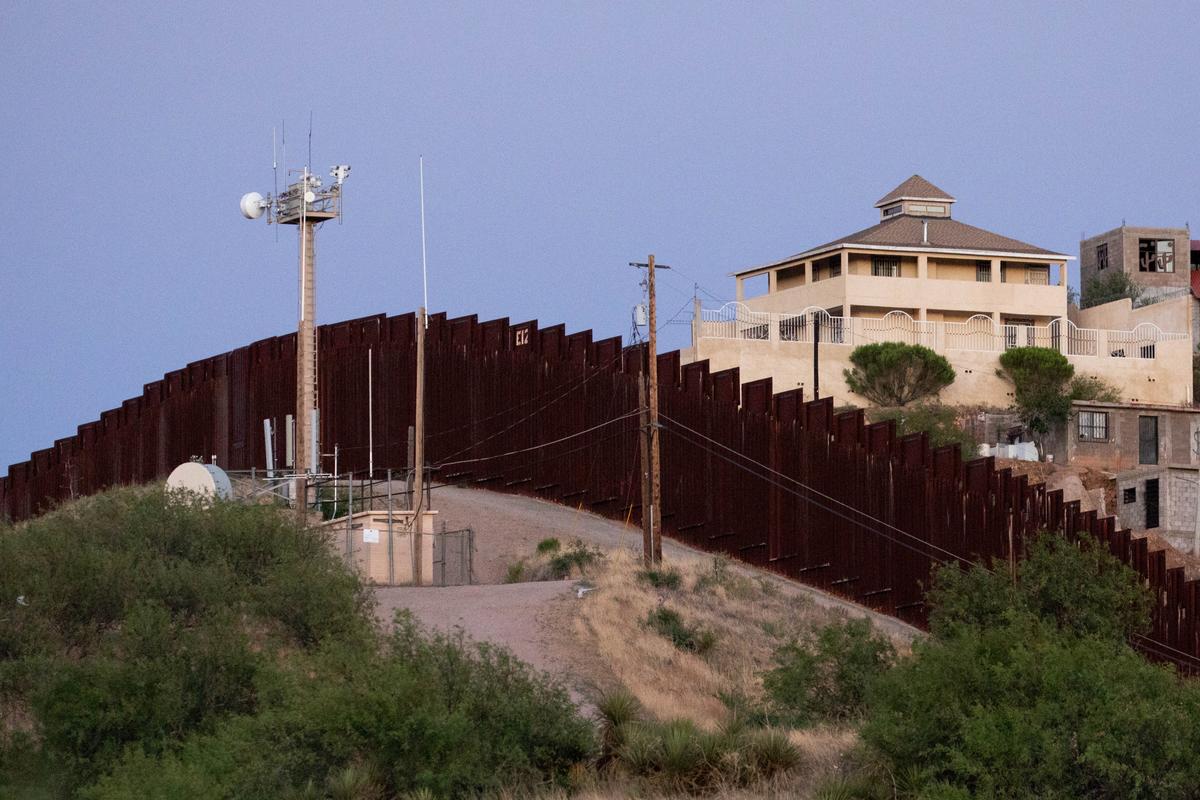 A surveillance tower sits at the U.S.–Mexico border in Nogales, Ariz., on May 23, 2018. (Samira Bouaou/The Epoch Times)