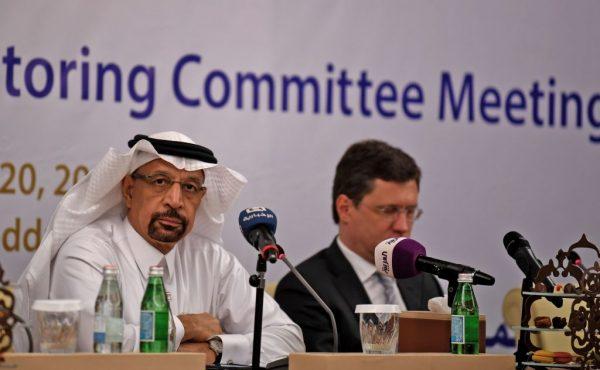 Saudi Energy Minister Khaled al-Faleh (L) and Russian Energy Minister Alexander Novak attend a meeting of OPEC and non-OPEC members to assess compliance with production cuts and to discuss potential long-term cooperation, in Jeddah, Saudi Arabia on April 20, 2018. (AMER HILABI/AFP/Getty Images)