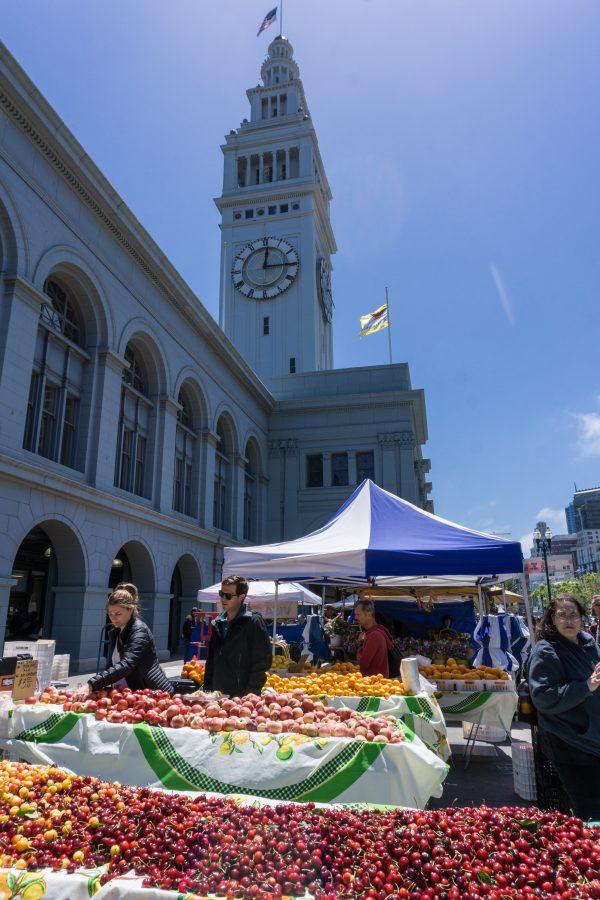 San Francisco's iconic Ferry Building backdrops spreads of gleaming fruit. (Crystal Shi/The Epoch Times)