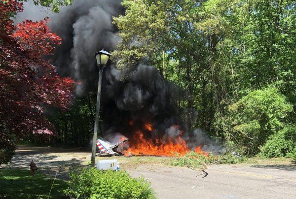 A small, vintage plane crashes in Long Island on May 30, 2018. (Lauren Peller via Storyful)