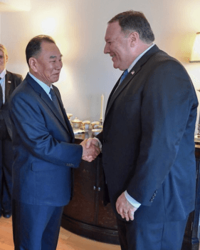 Secretary of State Mike Pompeo (L) greets North Korea's vice chairman, Kim Yong Chol, at a dinner in New York City on May 30, 2018. (State.Gov)