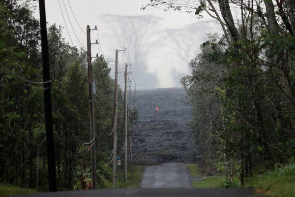 The Kilauea lava flow cuts off Kahukai Street, in the Leilani Estates near Pahoa, Hawaii. (Reuters/Marco Garcia)