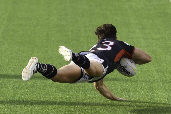 Jack Neville scores this flying try to further advance Hong Kong to their 91-10 win in the 2018 Asian Rugby Championship. (Bill Cox/Epoch Times)