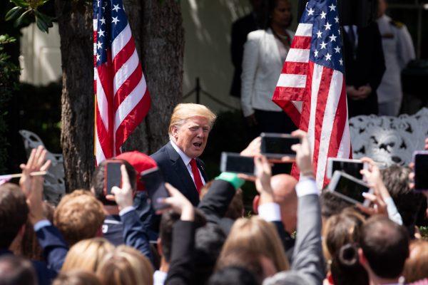 President Donald Trump greets guests in front of the White House in Washington on June 5, 2018. (Samira Bouaou/Epoch Times)