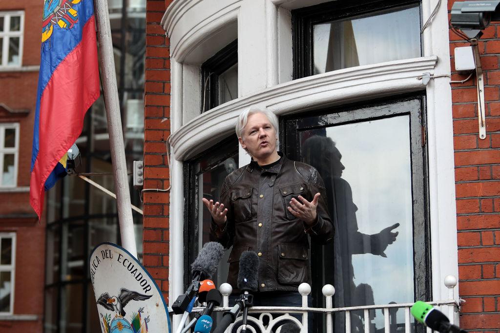 WikiLeaks founder Julian Assange speaks to the media from the balcony of the Embassy Of Ecuador in London, England on May 19, 2017. Kim Dotcom recently tagged Assange to help start a new social network. (Jack Taylor/Getty Images)